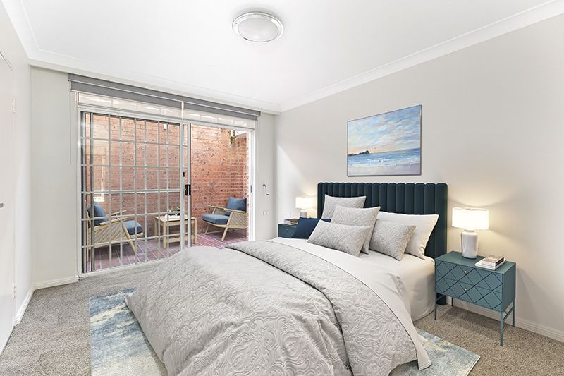 Newly renovated and superbly positioned unit with sunny front terrace and large courtyard.
