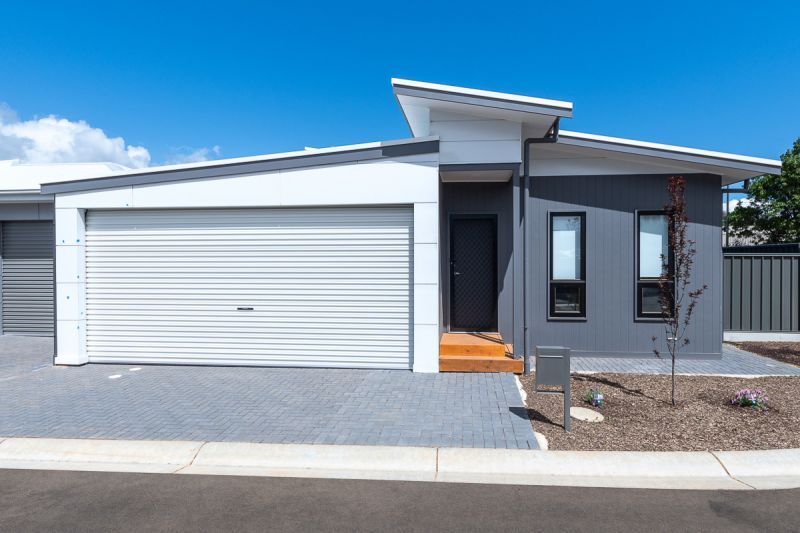 Spacious Design Inside and Out -  Large Rear Garden with Decked Entertaining Area.