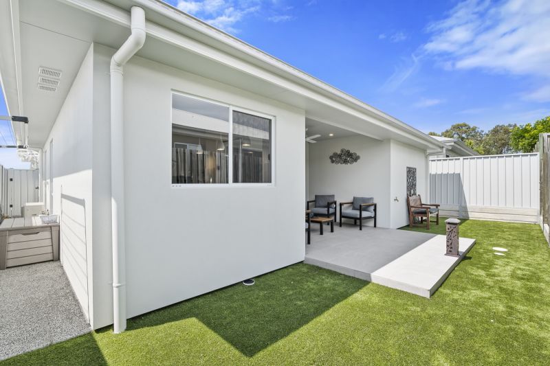 Elevated Home with Spacious Backyard and Modern Interior