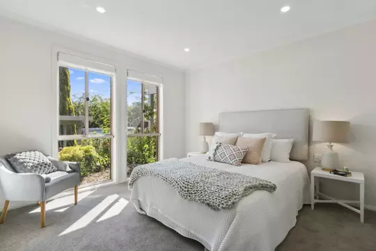 Exclusive three-bedroom villa featuring a pristine backyard