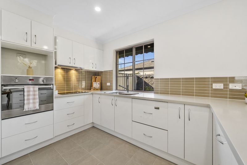 Refreshed Unit with Sweet Garden in Leafy Village Court
