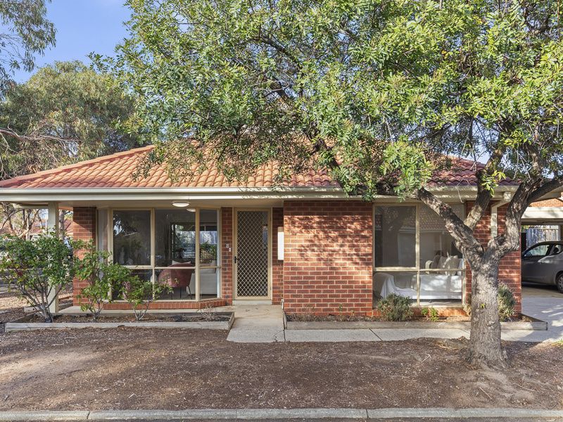 Bright Corner Unit with Stylish Upgrades and Garden