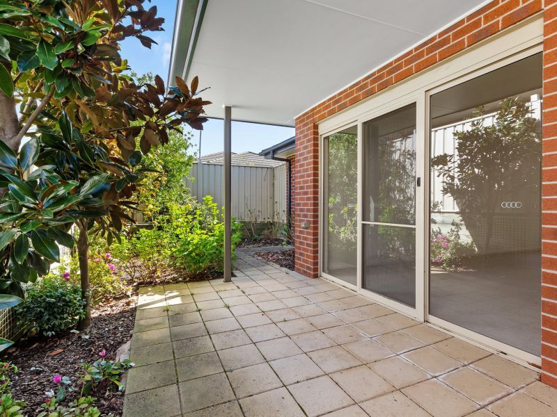 Beautifully Updated Unit with High Ceilings and Convenient Layout