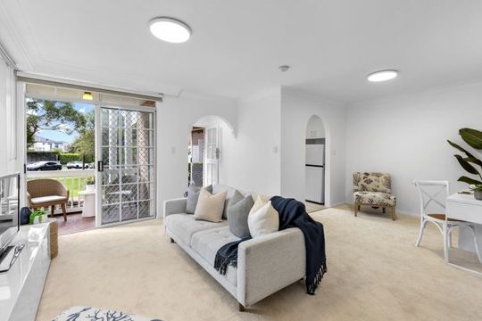 Beautifully renovated unit surrounded by lush gardens