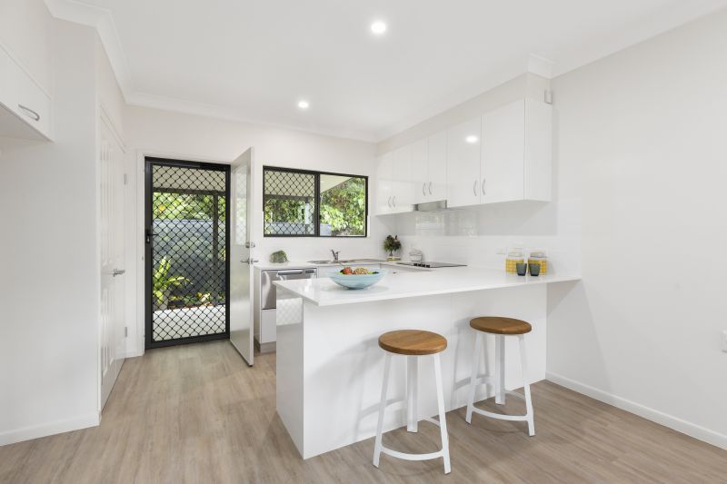 Open-plan unit with fully fenced backyard