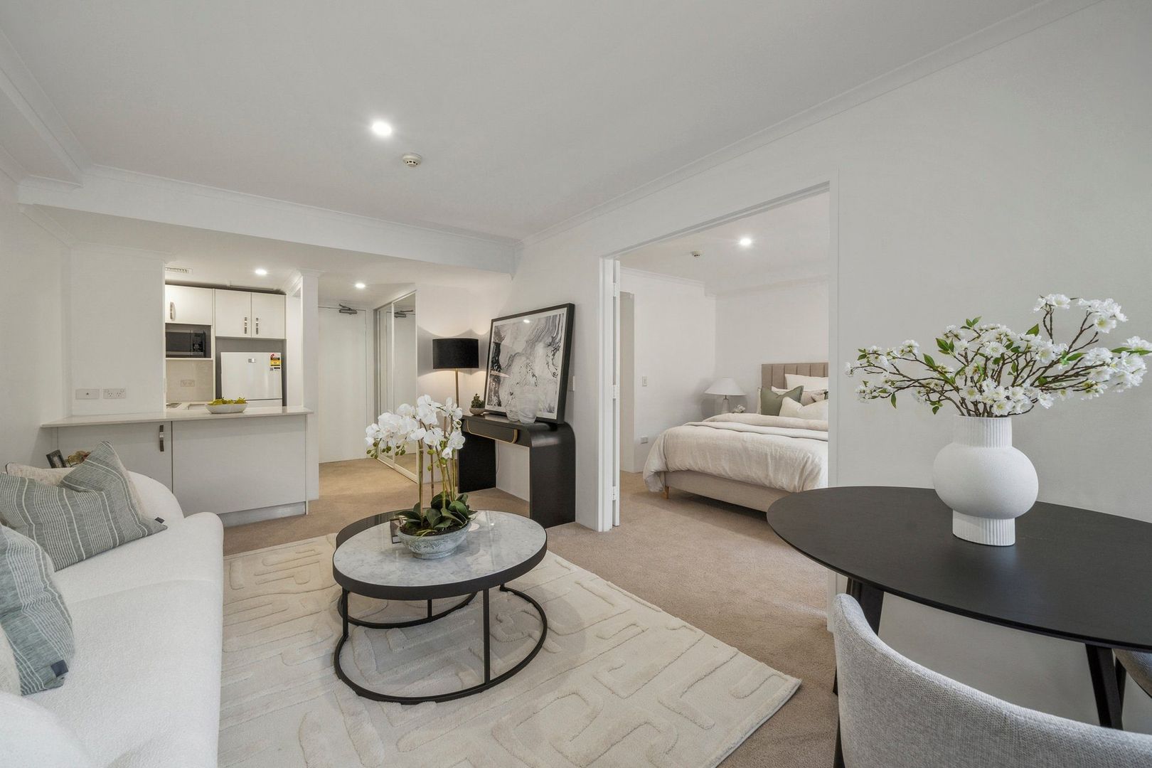 A serviced apartment surrounded by garden greenery