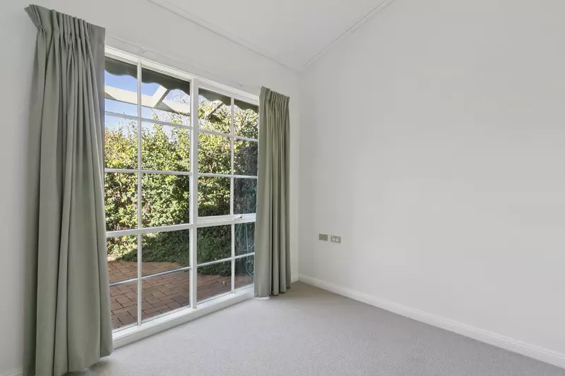 Village Heart Retreat with Vaulted Ceilings and Courtyard