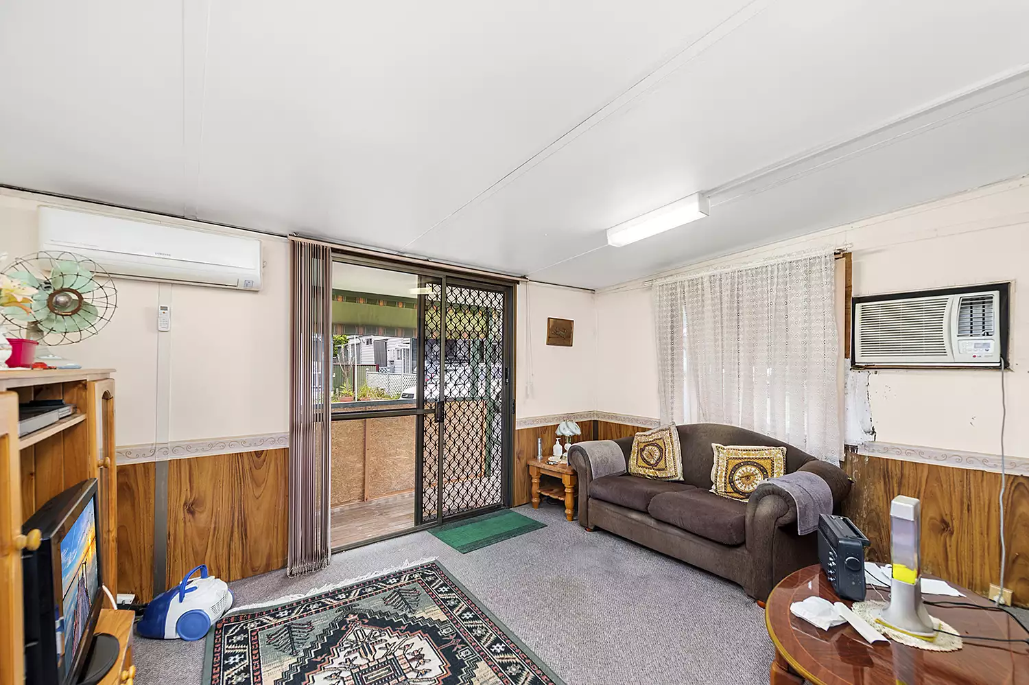 DEPOSIT TAKEN / UNDER CONTRACT - Renovate and Retire - Great Corner site with potential packed home - Carport and Storage