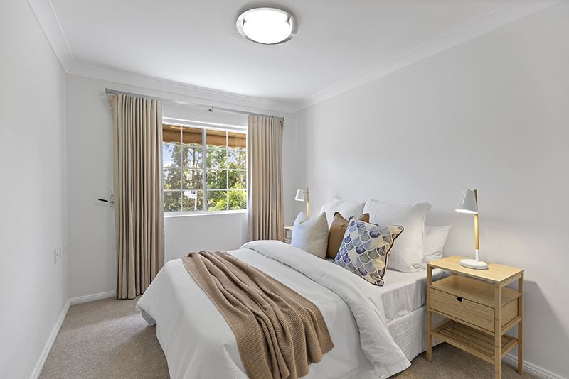 Beautifully presented unit close to clubhouse with district views.