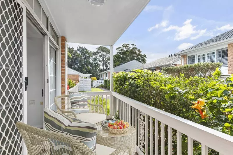 Centrally located, renovated ground floor unit surrounded by lush gardens with large courtyard.