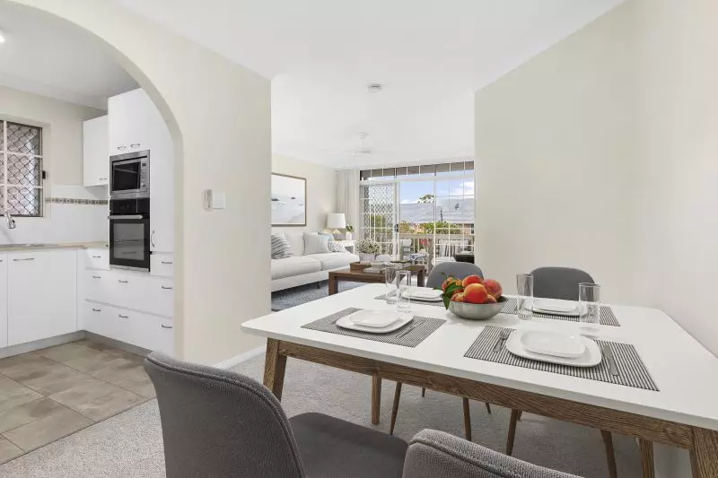 Elegantly renovated ground floor unit overlooking beautiful gardens close to clubhouse.