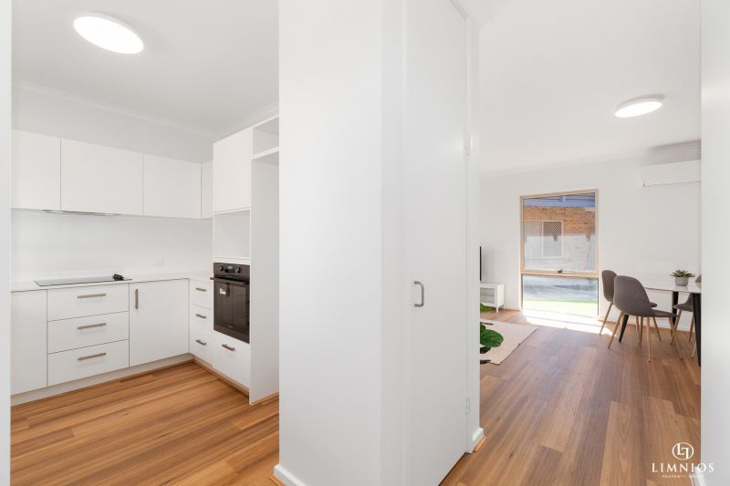 Light, bright 2 Bedroom Villa with Modern Upgrades in a Prime Location!