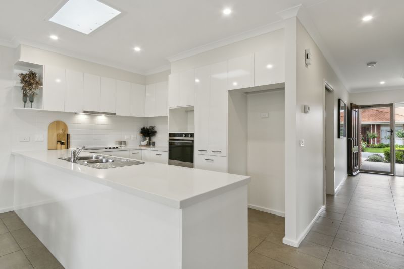 Discover serene living in modern 2 Bed + Study villa