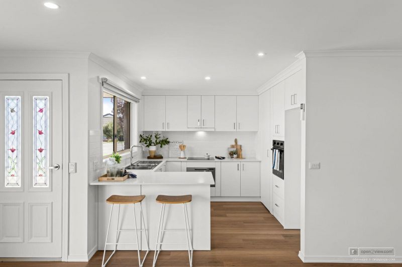 Beautifully Refurbished Two-Bedroom Home Opposite the Community Centre