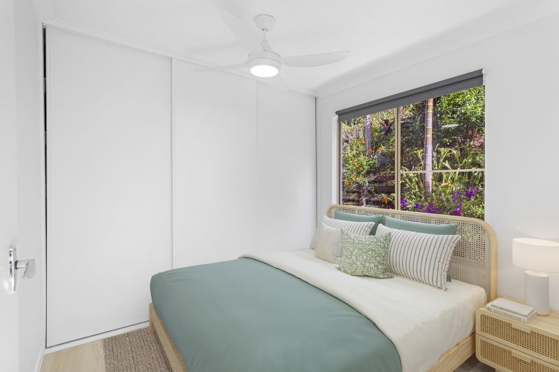 Modern ground-floor 2-bedroom villa with garden views