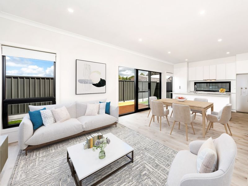 Spacious Design Inside and Out -  Large Rear Garden with Decked Entertaining Area.