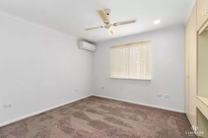 SOLD! A bright, light filled unit with a sunroom and leafy outlook