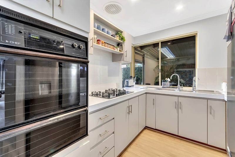 Sunny Yard and Vibrant Village Lifestyle