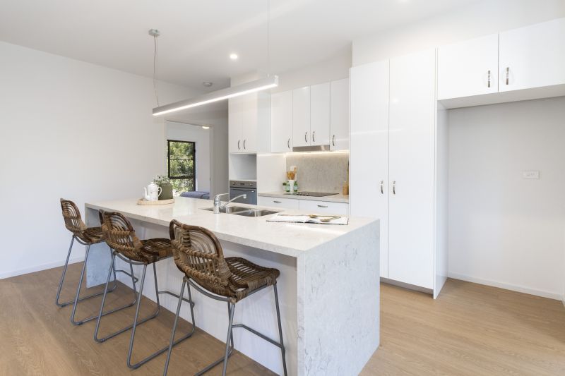 Vibrant two-bedroom villa with attached garage