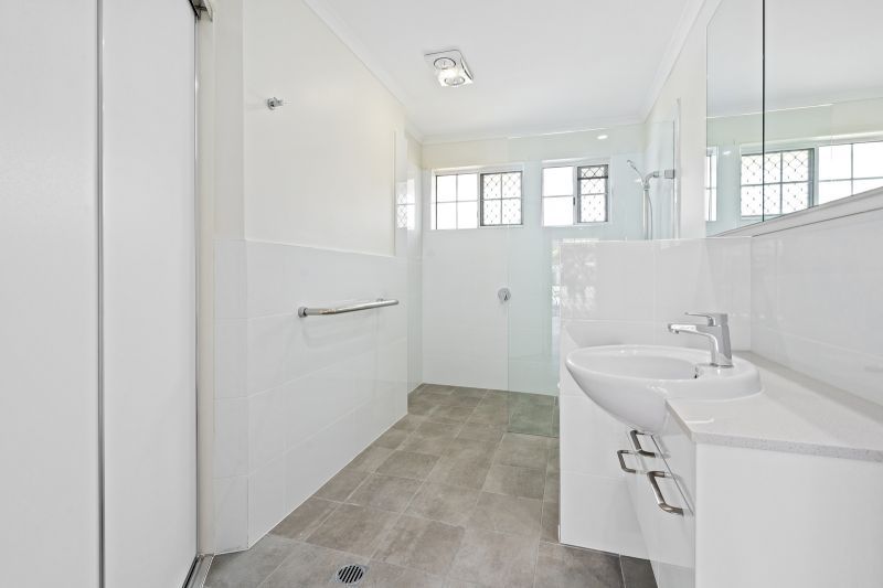 Beautiful two-bedroom, one bathroom villa with covered rear entertaining area.