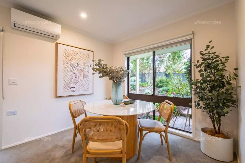 Exclusive two-bedroom villa featuring a pristine backyard