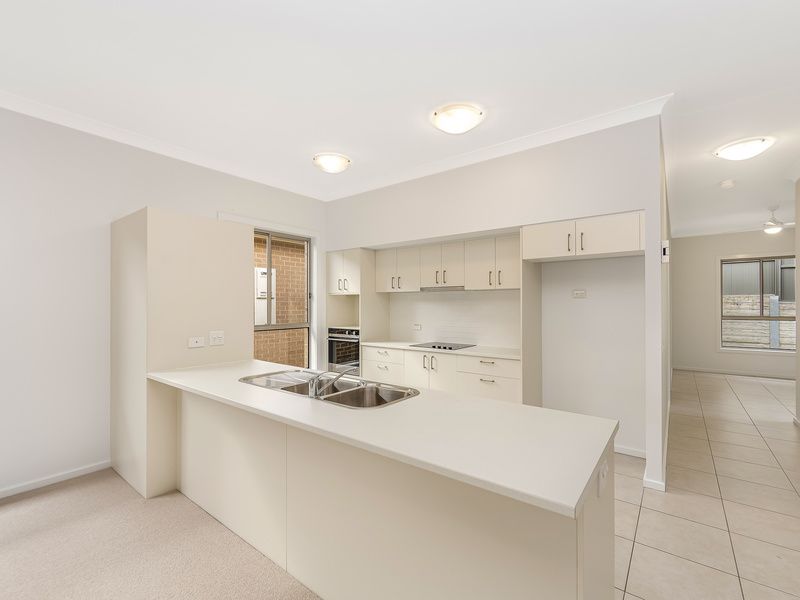 Sunlit Villa with Fresh Interiors and Flexible Living Spaces