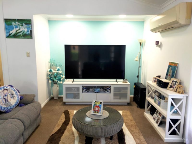 Relaxed Living in a Private Village Oasis