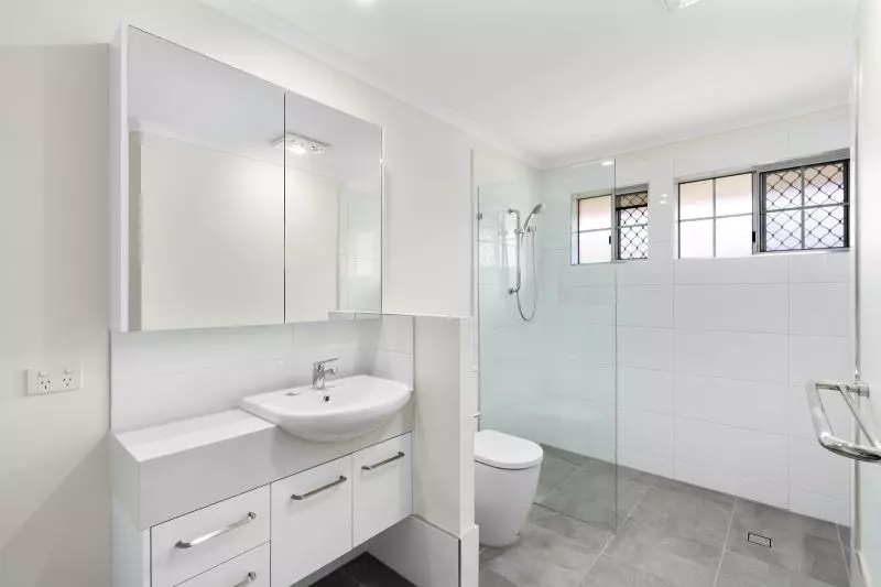 Beautiful two-bedroom, one bathroom villa with enclosed rear entertaining area.