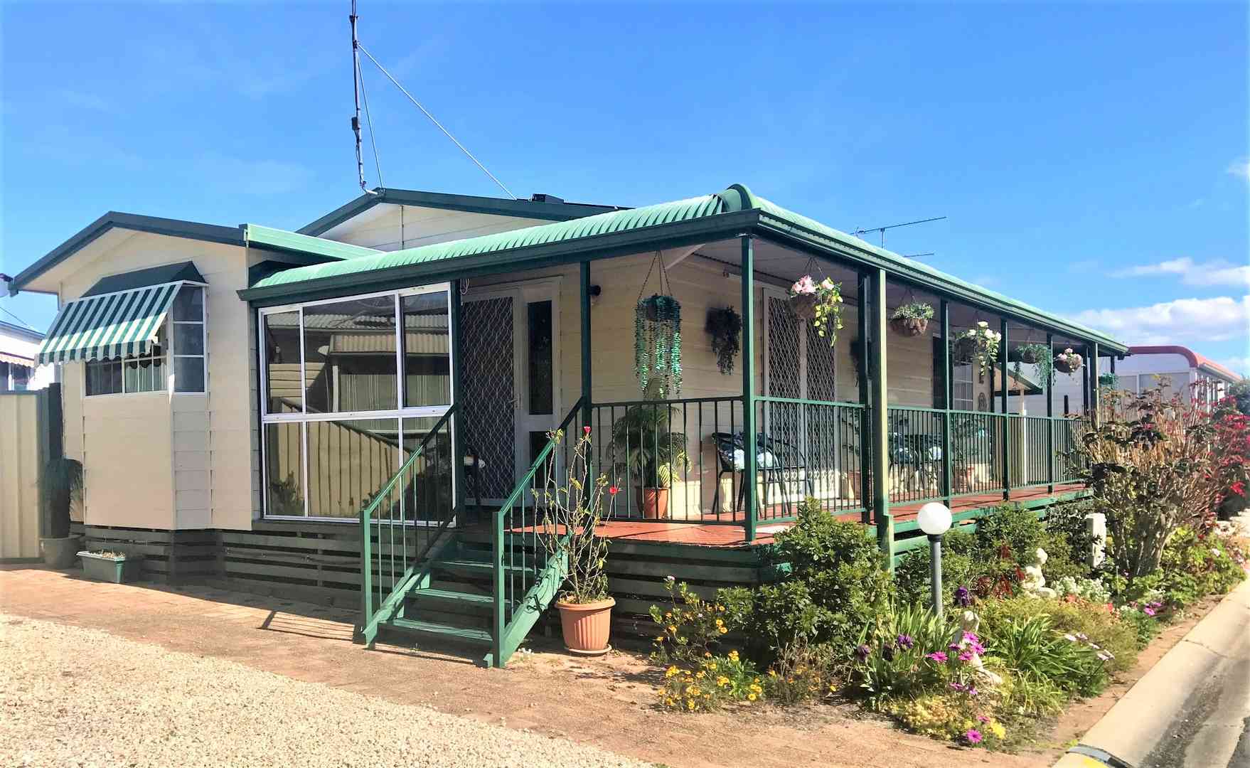 Two bedroom home on a large site,  a  short stroll away from recreation area, lush bushland and shopping centre