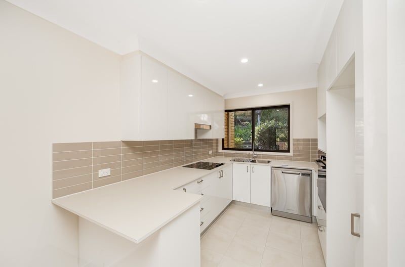 Modern and Stylish Living with a Balcony