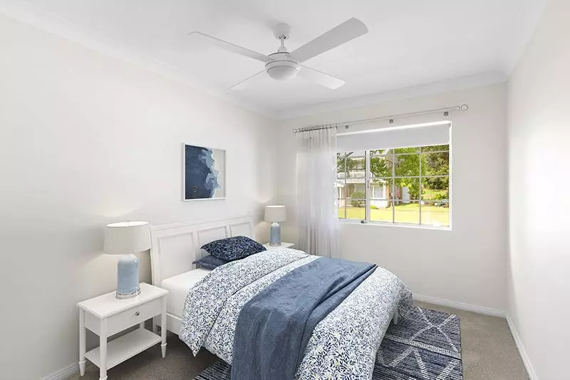 This elegant north east facing two bedroom unit offers refined living in a peaceful, private setting.