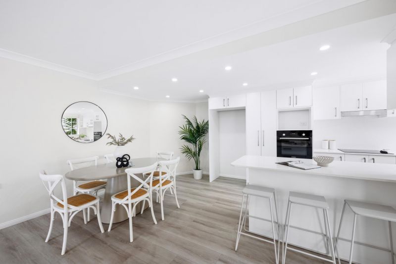 Fully renovated, contemporary style 3 bedroom unit with garden surrounds.