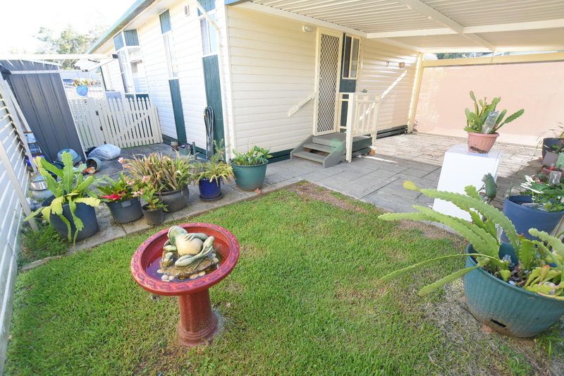 2 bedroom cottage style home with large wrap around verandah!