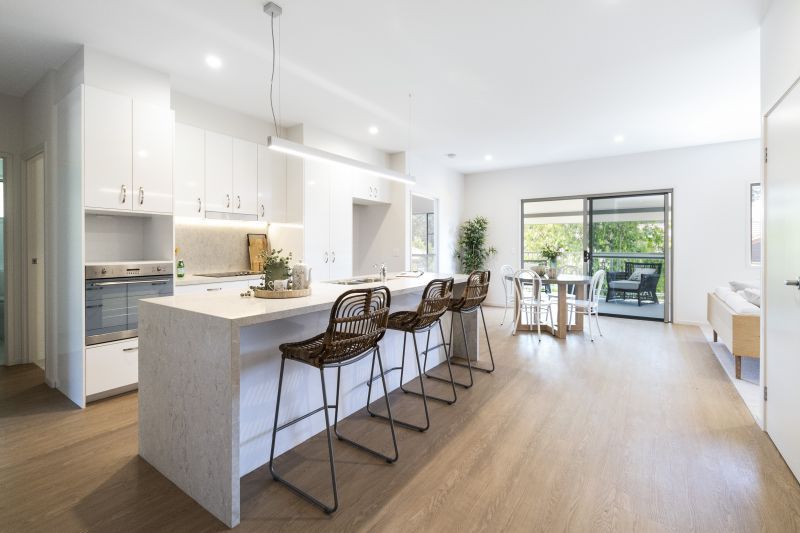 Vibrant two-bedroom villa with attached garage