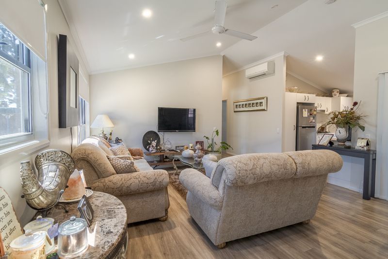 Downsize to this modern 2 bedroom plus full study home in popular over 55s living estate