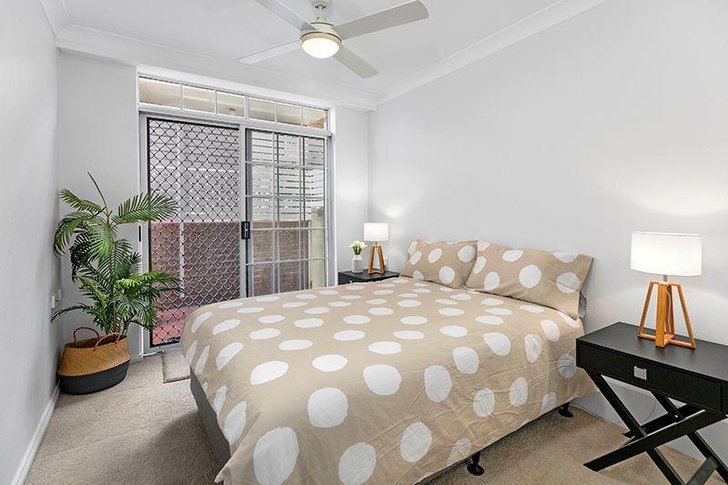 Exquisitely  renovated corner ground floor unit close to the clubhouse