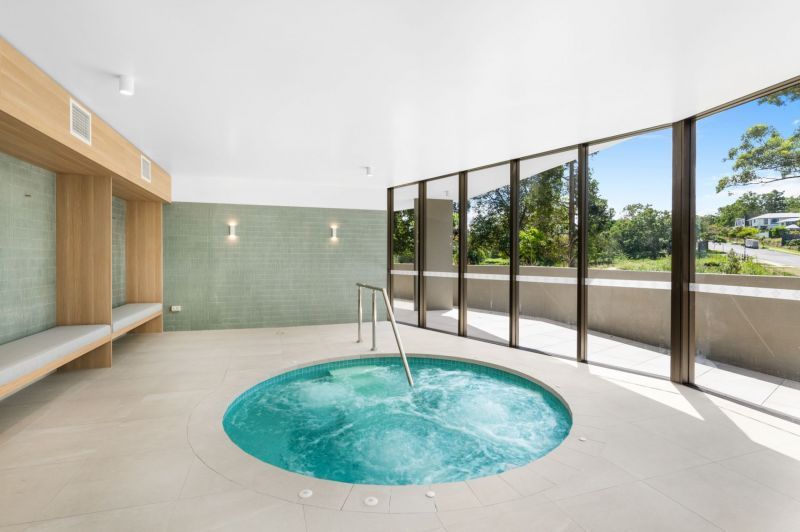 Spacious courtyard apartment surrounded by established gardens