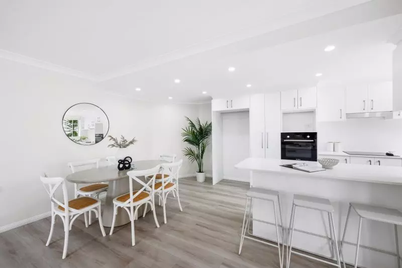 Fully renovated, contemporary style 3 bedroom unit with garden surrounds.
