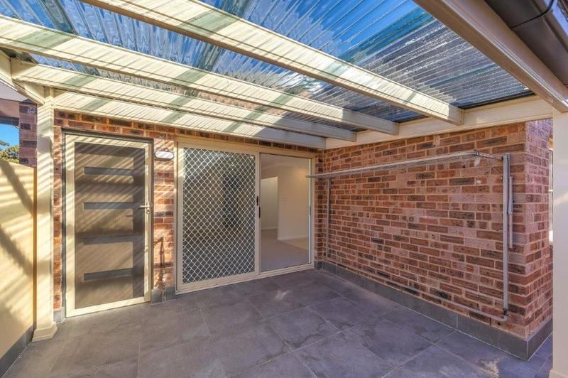 Modern Unit with Sunlit Courtyard, Water Views, and Stylish Upgrades