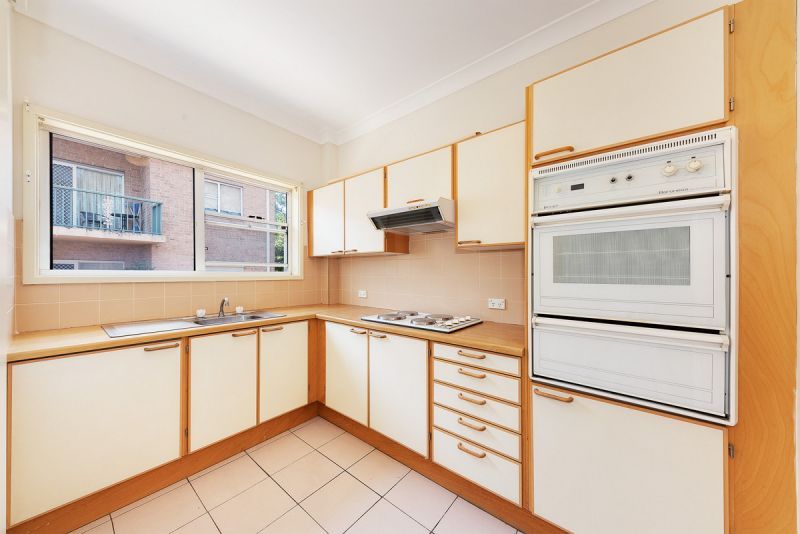 SPACIOUS  Freshly carpeted 2 bedder with both North and South facing balconies