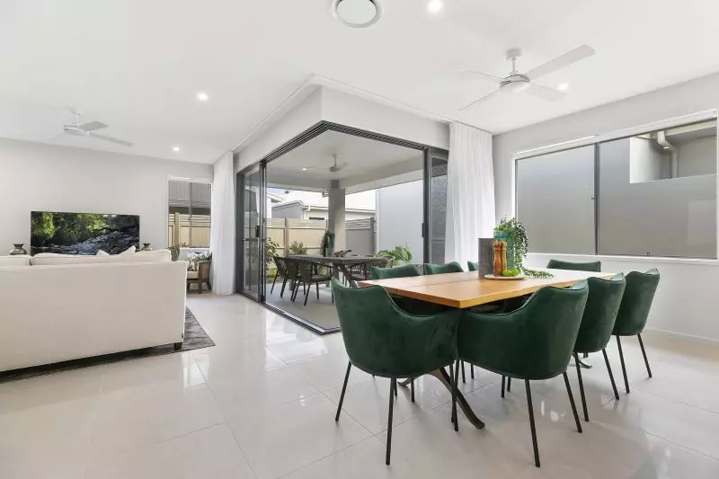 STUNNING DISPLAY HOME FACING TRANQUIL LAKE