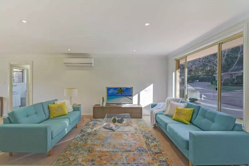 Sit back and relax on your patio! Looking onto the parkland enjoying the lifestyle here at Tarragal Glen!