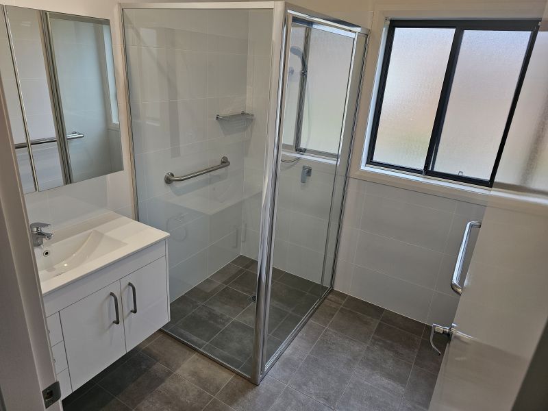 2 Bedroom + Sunroom and QLD room. North facing Lounge.