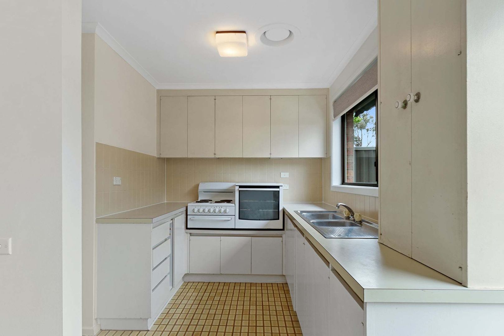 Private, Updated Unit with Courtyard in a Friendly Village Setting