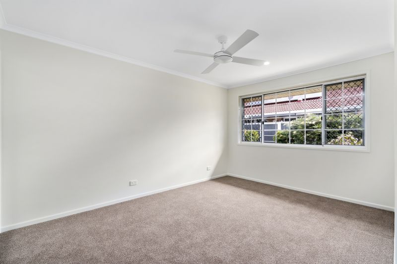 Beautiful two-bedroom, one bathroom villa with enclosed rear entertaining area.