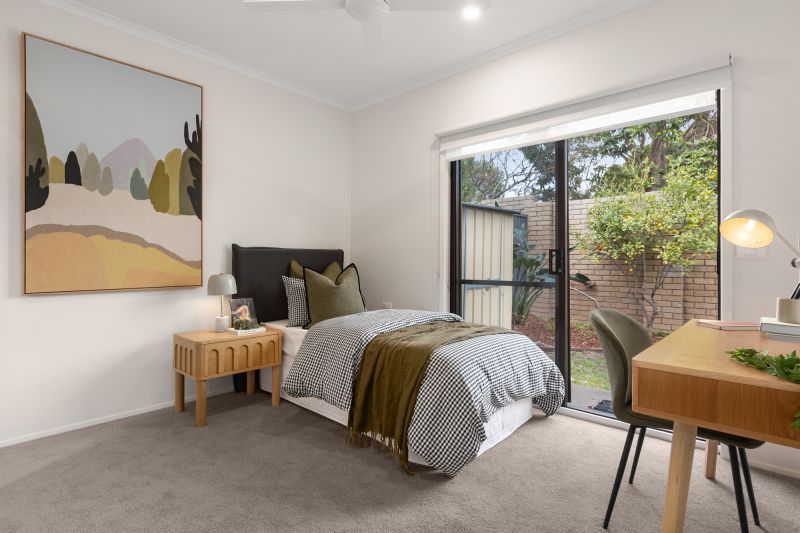 North-facing two-bedroom villa with private backyard