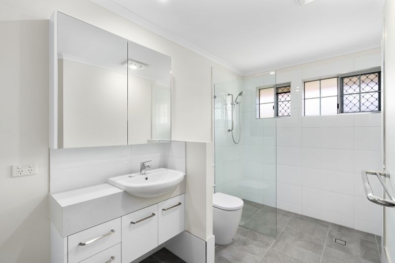 Beautiful two-bedroom, one bathroom villa with enclosed rear entertaining area.