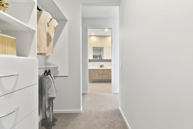 STUNNING DISPLAY HOME FACING TRANQUIL LAKE