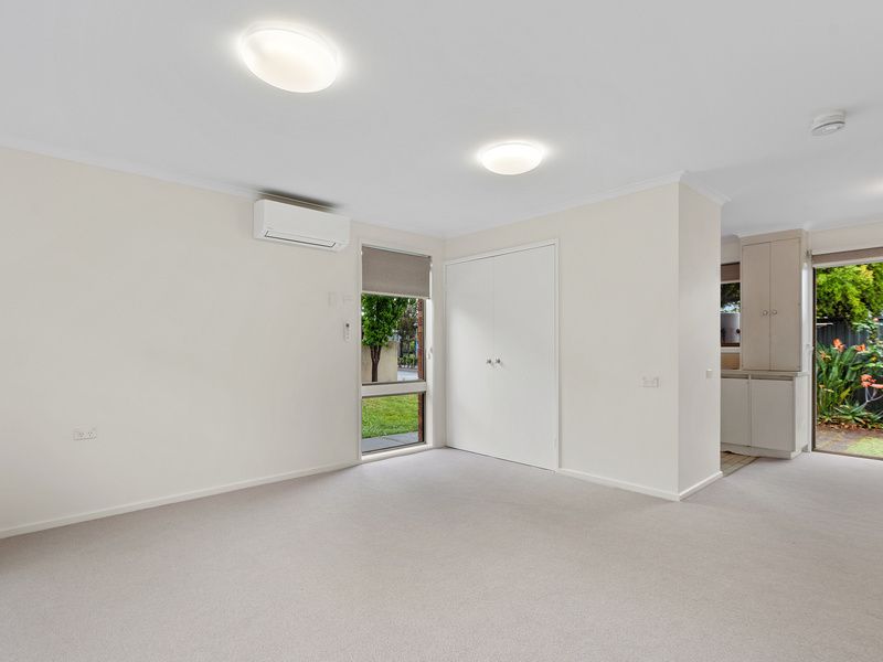 Private, Updated Unit with Courtyard in a Friendly Village Setting