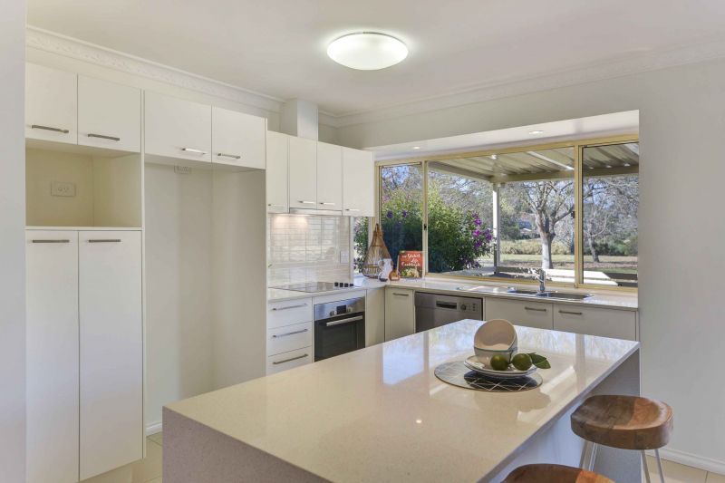 Sit back and relax on your patio! Looking onto the parkland enjoying the lifestyle here at Tarragal Glen!